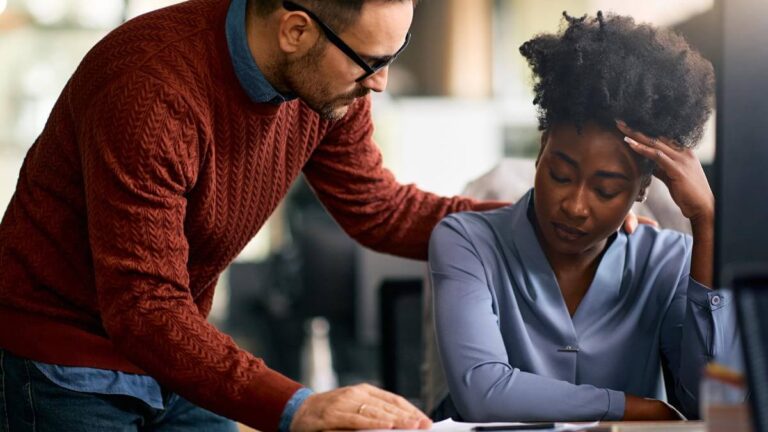 Featured Blog Image: Providing Support After a Loss A coworker Providing Support After a Loss to an employee who is upset