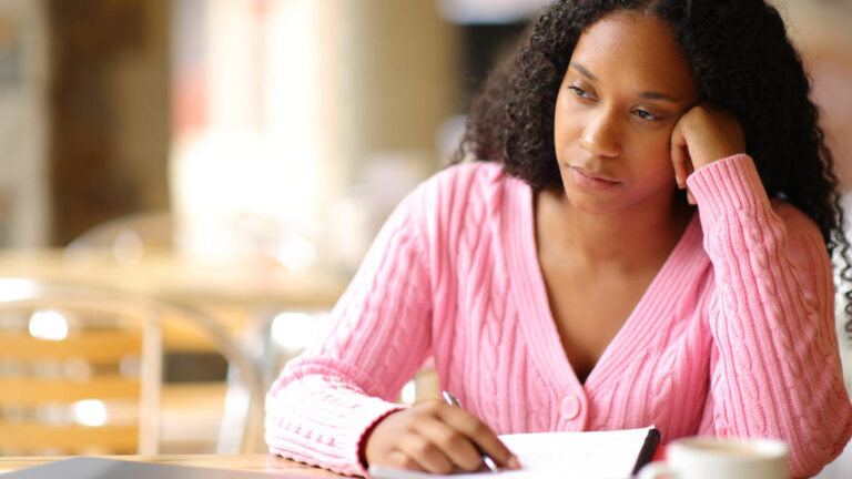 Blog Featured Image – Grieving the Loss of a Friendship Black distracted apathetic student in a coffee shop