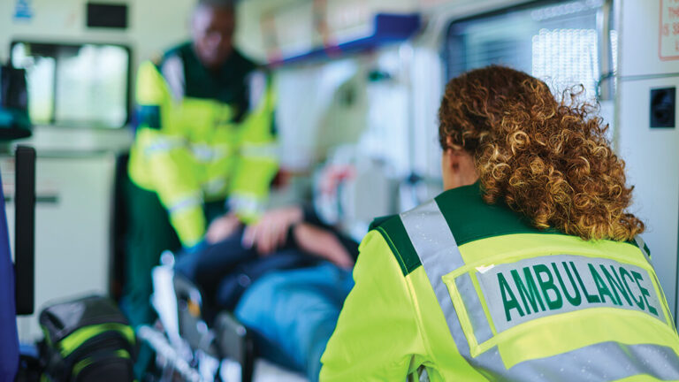 Coping with Trauma for First Responders Ambulance crew preparing casualty