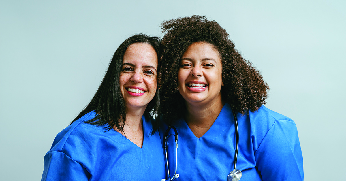 Portrait of smiling female healthcare professionals