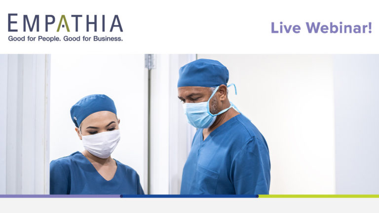 First Responders Healthcare coworkers walking and analyzing digital tablet at hospital - wearing face mask