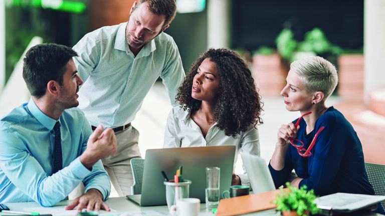 Cooling a Heated Moment Multi-ethnic group of entrepreneurs discussing business