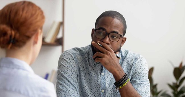 Man talking to an applicant at job interview Man talking to an applicant at job interview