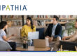 Multiethnic group of business colleagues discussing teamwork strategy, talking in meeting co-working space, sitting on couch. Manager explaining creative ideas for brainstorming, speaking