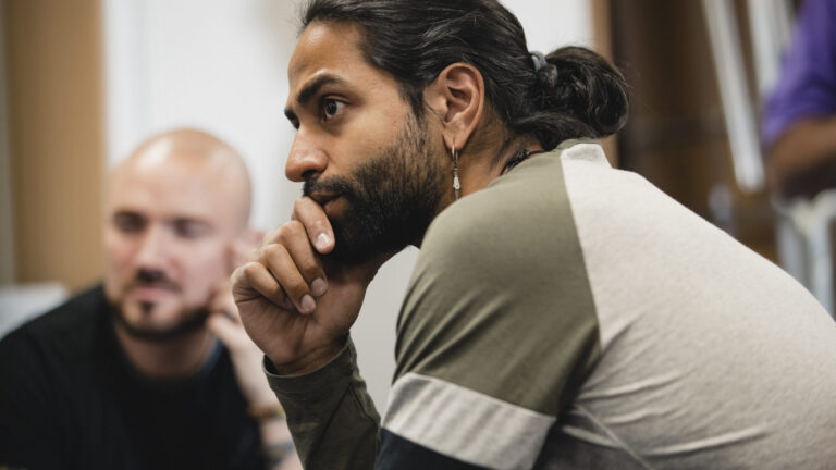 We Understand How You Feel man listening resting head in hand