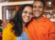 Two family members hugging and diffusing family Conflict and the Holidays