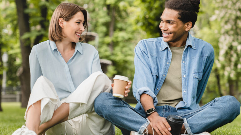 Homepage – Hero Image.jpg Coworkers enjoying coffee outside as part of Empathia's employee assistance program