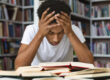 Stressed college student trying to study