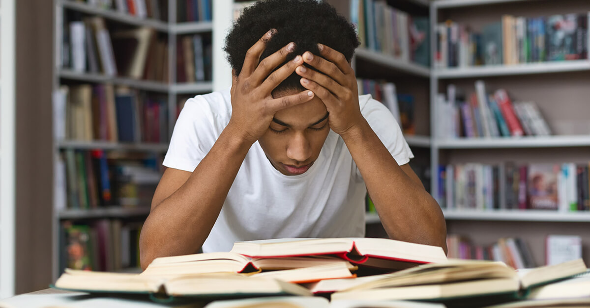 Podcast Featured Image – Episode 57 Stressed college student trying to study