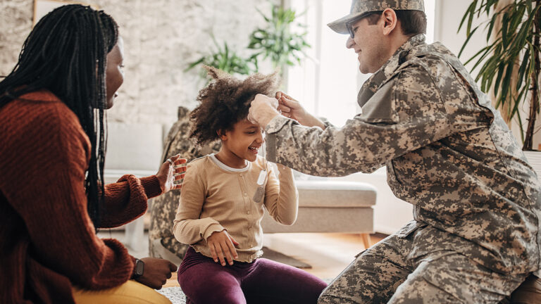 The Stress of Deployment Military soldier arrived home to his family after serving his country in the war