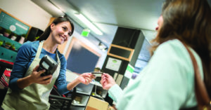 Cashier at the supermarket getting a card payment