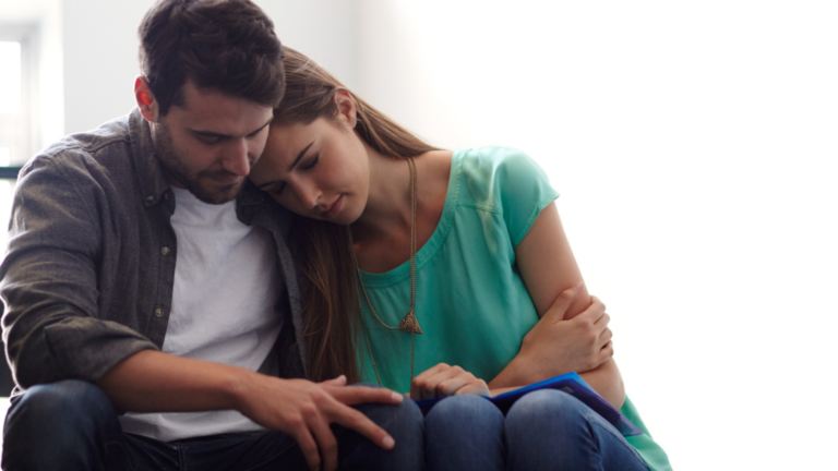 helping-someone-who-is-struggling Shot of a man comforting a distressed woman