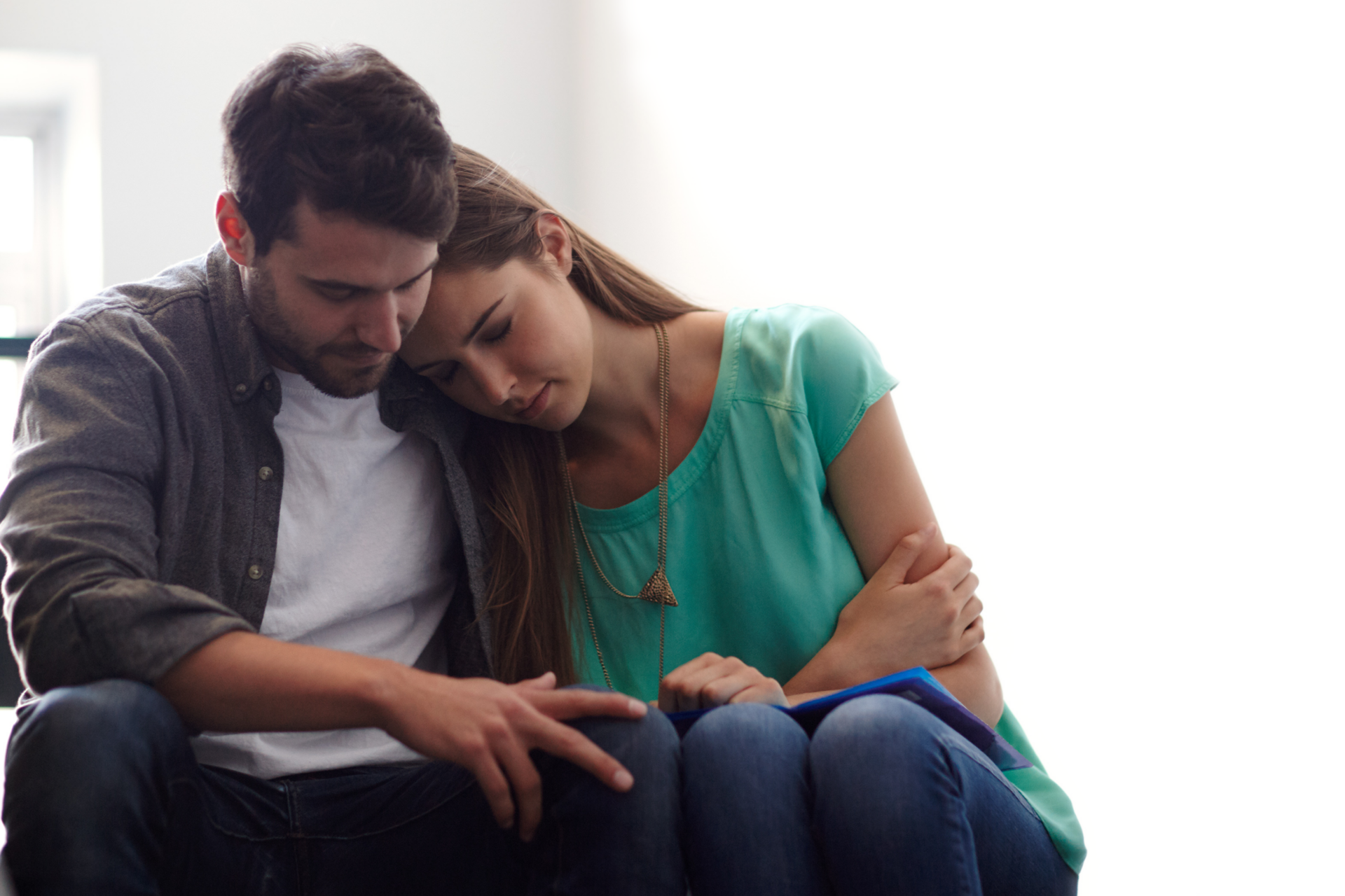 Shot of a man comforting a distressed woman