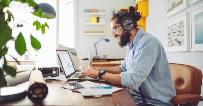 managing-hybrid-teams-featured-image man working at home