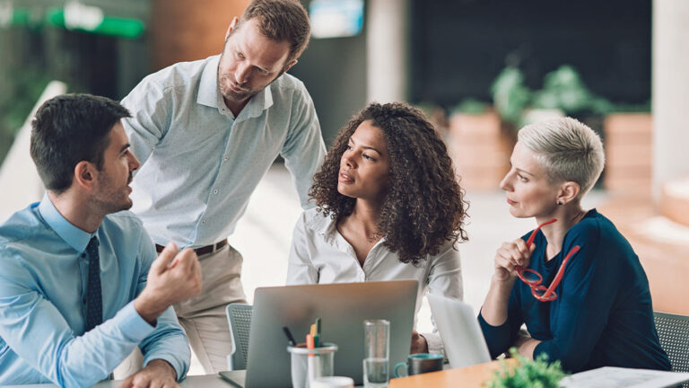 soft-skills-featured-image Multi-ethnic group of entrepreneurs discussing business